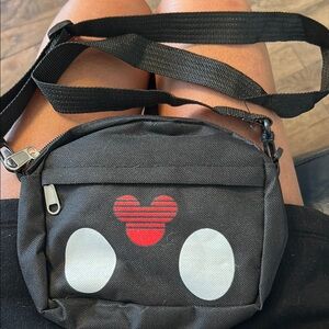 Black Crossbody Bag with Red and White Design